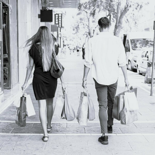 back-view-young-couple-walking-street.jpg